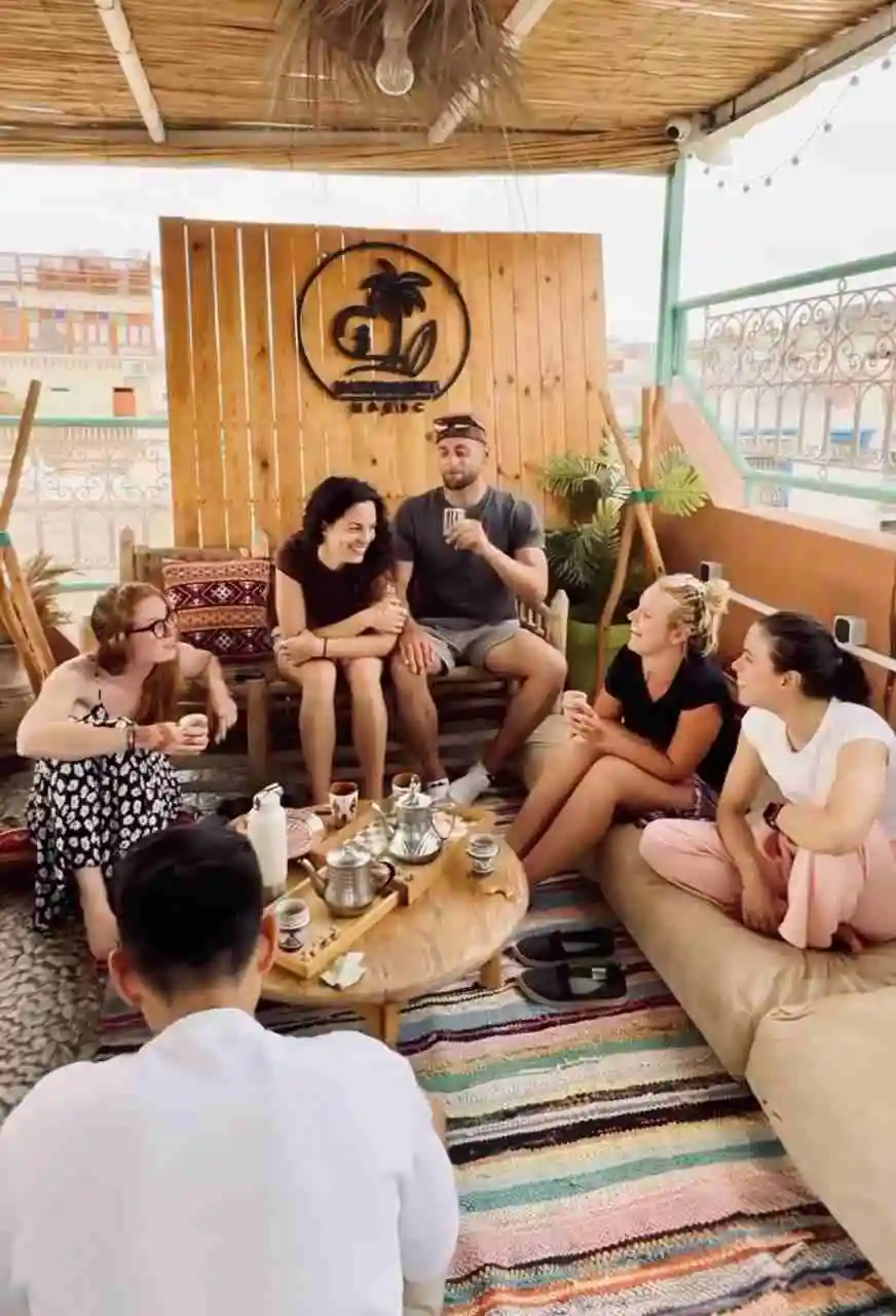 natural surf house morocco tea time sunset roof top